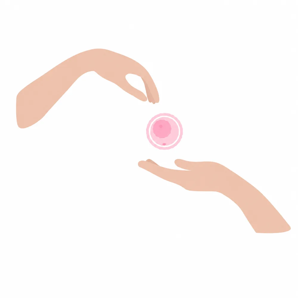 Illustration of a donor egg passed between two hands