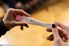 Couple holding a positive pregnancy test